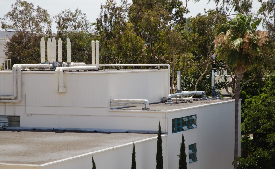 San Diego State University officials closed the Professional Studies and Fine Arts building in mid-March when fumes from a material used to repair the roof sickened people in the building. This photo, taken July 25, 2019, shows the PSFA building's roof.