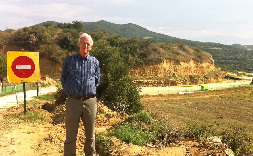 Athanasios Zournatzis heads the village of Mesolakkia near the tomb. Though the public has not been allowed to visit the tomb itself, he says he's seen a steady stream of international visitors since the discovery was announced. "We were just a sleepy village of tobacco and almond farmers," he says. "Now, suddenly we're a tourist attraction."