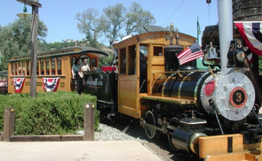 Photo of the 1907 Baldwin 0-4-0 Steam Locomotive and Tender, city-owned antique railroad equipment in Old Poway Park. The steam locomotive runs the 1st and 3rd weekend of every month. 