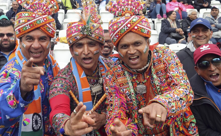 India's fans await the start of Thursday's Cricket World Cup match between India and New Zealand in Nottingham, England.