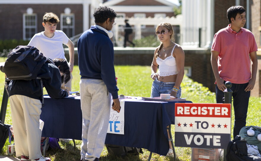 Students at the University of Virginia help eligible voters register to vote in Charlottesville, Va., in 2024.