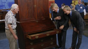 At ANTIQUES ROADSHOW in Milwaukee, Wisconsin, appraisers Leigh and Leslie Keno, of Leigh Keno American Antiques and Sotheby's respectively, team up to evaluate this desk and bookcase, passed down to the owner from his great-grandfather, Richard D. Hubbard, a former governor of Connecticut. The piece is a classic example of New York 18th-century design and cabinetmaking and even has a secret drawer for hiding valuables. One question remains: Have the top and bottom been "married," or is the entire piece original? Pending further investigation, the Kenos offer a range of auction values from $20,000 to $250,000.