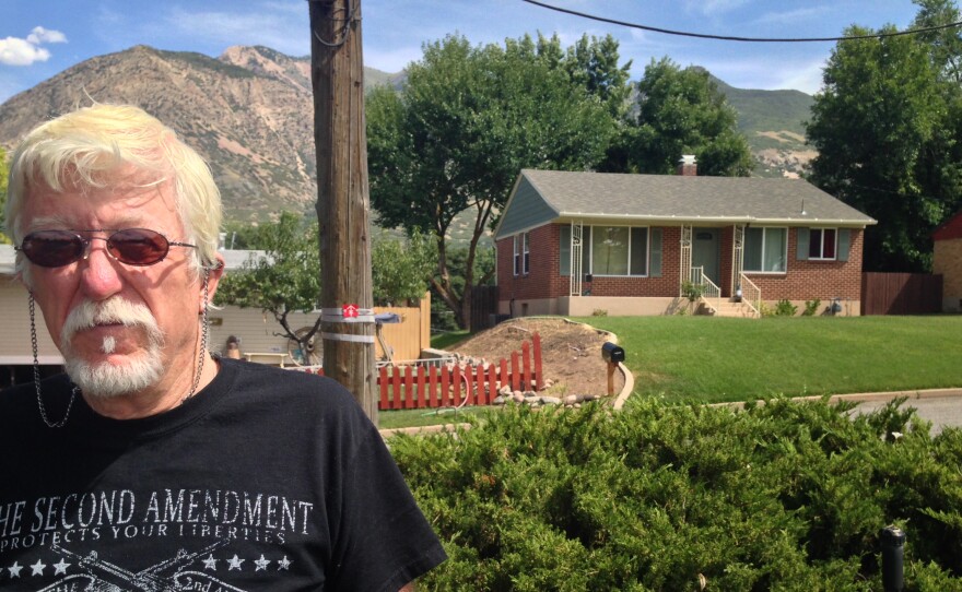 Michael Stewart, standing across the street from the house where his late son Matthew David Stewart used to live in Ogden, Utah. It was raided by the local drug task force in January of 2012, and an agent died in the crossfire, igniting a state-wide controversy over the use of police tactical teams in drug cases.