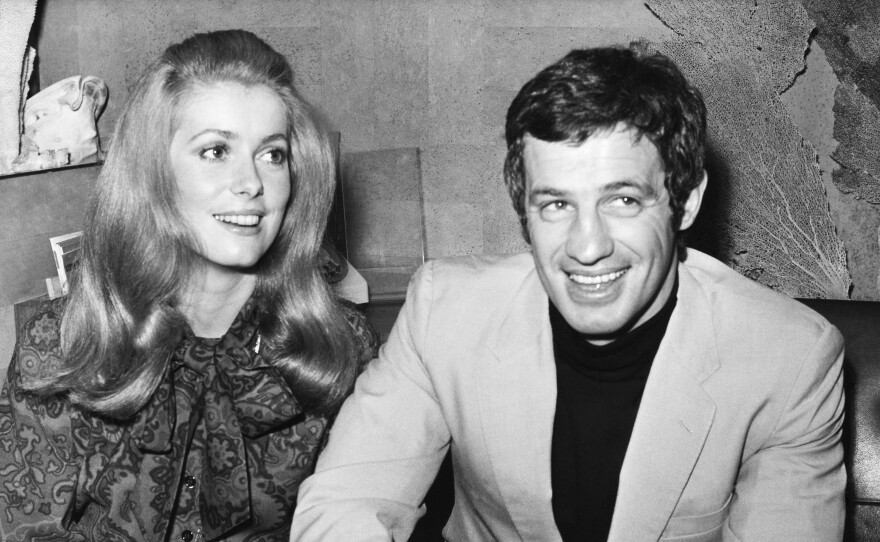 French actors Jean-Paul Belmondo, right, and Catherine Deneuve, in 1969. They starred together in François Truffaut's film Mississippi Mermaid.