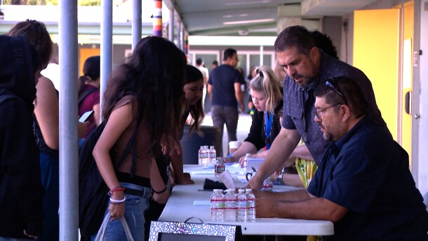 Bell Middle School students pick up their class schedules on the first day of school on Monday, Aug. 11, 2025.