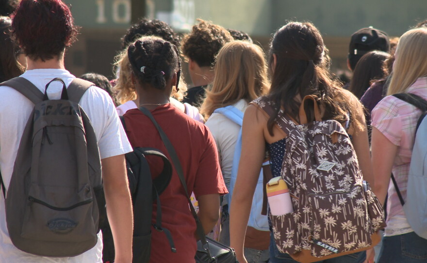 Students walk into Patrick Henry High School on San Diego Unified's first day of school on Monday, Aug. 10, 2026.