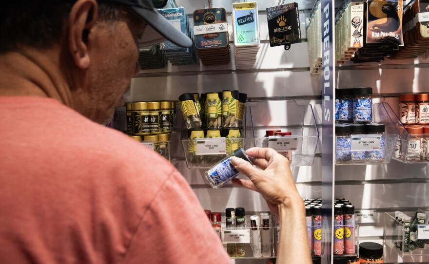 A customer inspects product 