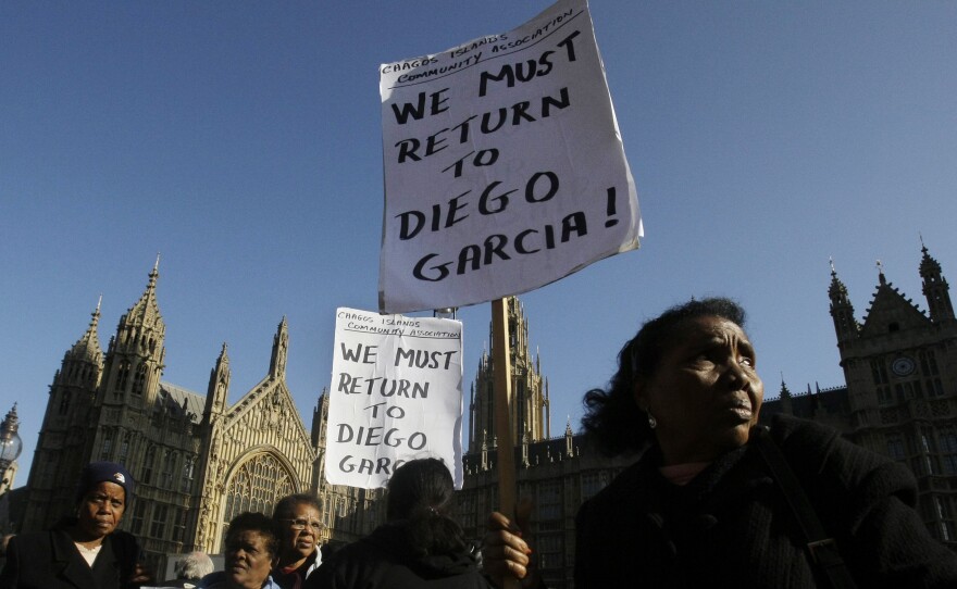 Women take part in a protest outside the Houses of Parliament in London in October 2008.