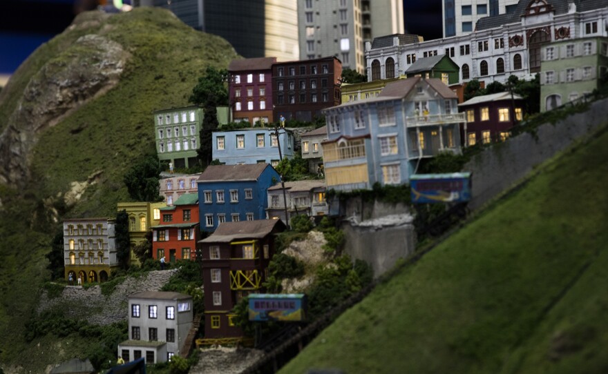 Tiny houses are lit from inside in this miniature model of Valparaíso, Chile.
