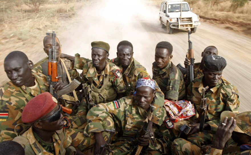 South Sudanese soldiers travel near the front line with Sudan last month. The two sides have clashed repeatedly in recent weeks.