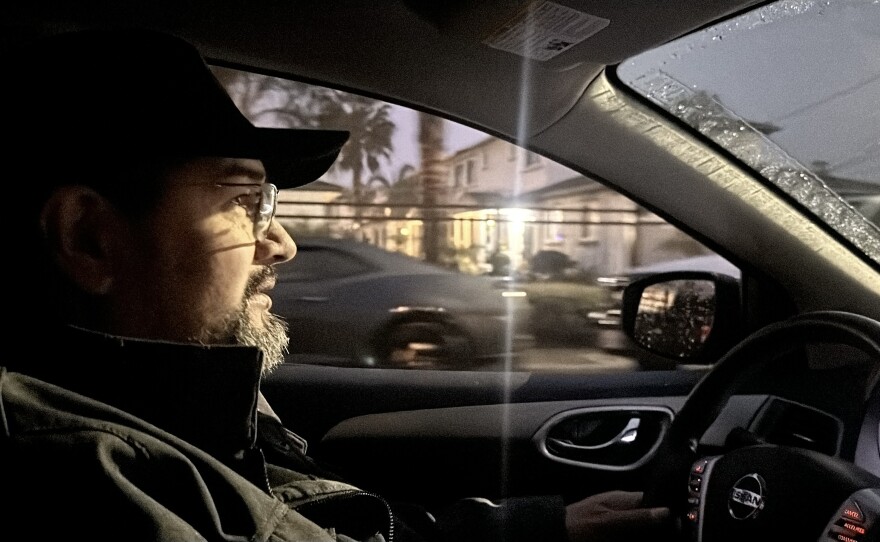 Benjamin Prado, an immigrant rights activist with Union del Barrio, drives around Linda Vista Friday, Feb. 7, 2025.