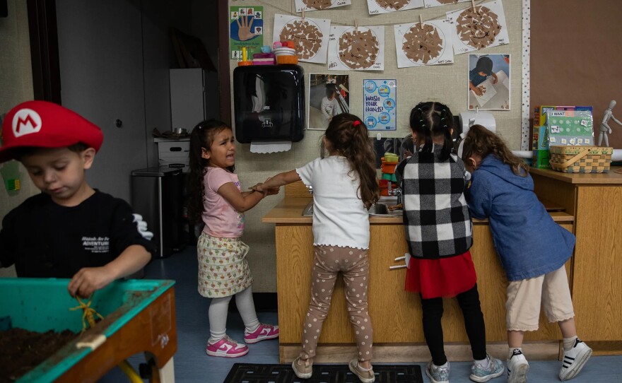 Students wash their hands after a painting activity at Mi Escuelita in San Diego on April 23, 2025. Many of the students at the preschool are students of color and come from low-income families. Mi Escuelita offers mental health services to both students and their families since those relationships play a role in a child’s development.