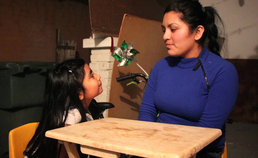 Farm worker Lorena Hernandez (right) with her daughter Luzliliana.