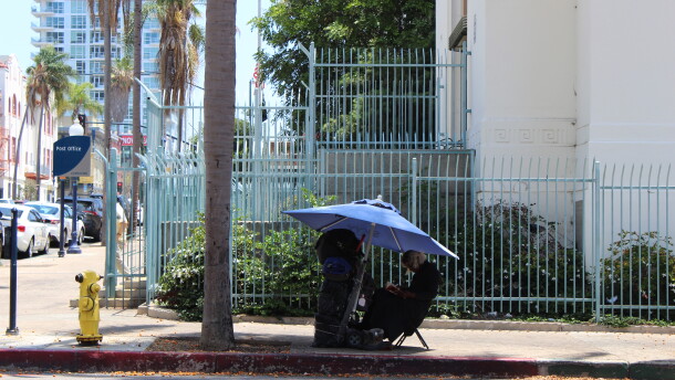 A person experiencing homelessness in downtown San Diego.