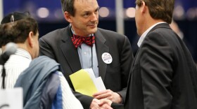 Charles Munger Jr. chairman of the Santa Clara County Republican party, center, talks with Assemblyman Brian Jones, R-Santee, right, at the California Republican Party convention in Sacramento, Calif., Sunday, March 3, 2013.