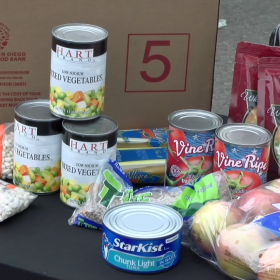 Pictured, a 40-pound box of food including canned goods, fresh fruit, milk and cheese. Boxes like this one were distributed by the San Diego Food Bank through its Senior Food Program. Chula Vista, Calif. Feb. 24, 2023.