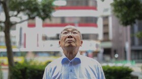 Seiichiro Mise looks up to the sky. He was 11 years old when the bomb fell on Nagasaki.