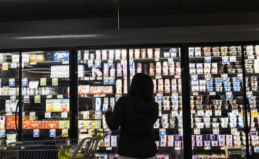 People shop for groceries at a Giant Food supermarket in North Bethesda, Md., on April 12.