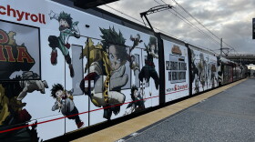 An MTS trolley wrapped in an advertisement for the anime TV show "My Hero Academia" is shown on June 30, 2026.