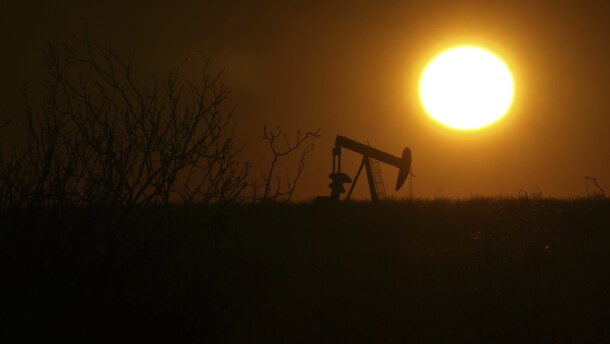 A pumping jack is visible at sunrise on Feb. 24, 2025, in Hobbs, New Mexico.