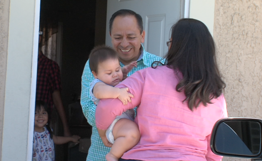 Bridget and Eduardo Bohorquez are reunited in Tijuana after one of her routine visits to San Diego with her children, July 27, 2016.