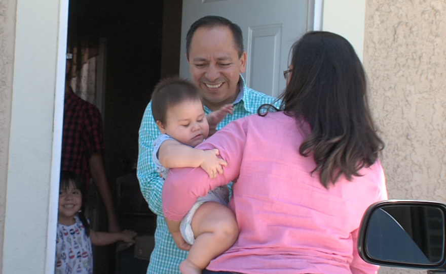 Bridget and Eduardo Bohorquez are reunited in Tijuana after one of her routine visits to San Diego with her children, July 27, 2016. 