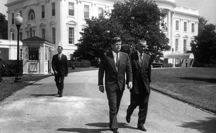 President Kennedy and Vice President Johnson prior to ceremony for the Workmens' Compensation Commemorative Stamp, Washington, D. C., White House, South Lawn, Aug., 31, 1961.