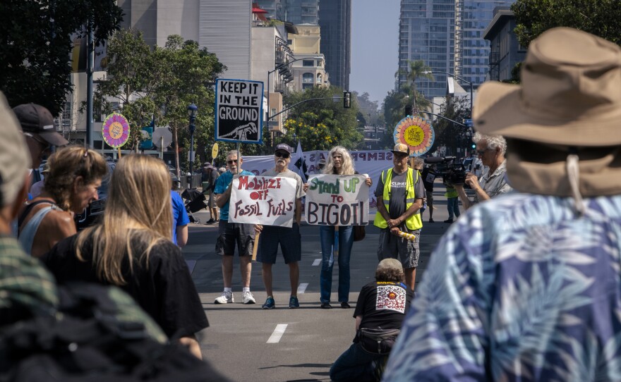 San Diego climate change activists rallied in front of Sempra Energy headquarters in downtown San Diego, July 24, 2023.