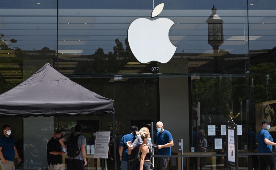 People enter an Apple Store at  in Glendale, Calif., on June 23.The second-highest court in the European Union says Ireland's tax break for Apple did not represent an unfair advantage.