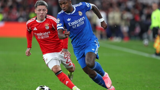 Benfica's Gianluca Prestianni fights for the ball against Real Madrid's Vinicius Junior during a Champions League playoff soccer match between SL Benfica and Real Madrid in Lisbon, Portugal, Tuesday, Feb. 17, 2026.
