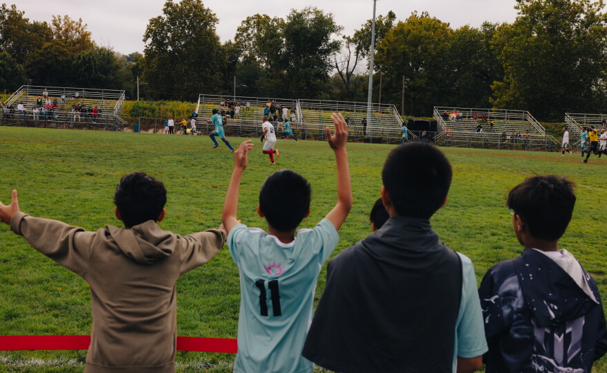 Members of ARU's Soccer for Success program react as the Nepali-speaking Bhutanese men's soccer teams play in the Kalu Singh Tamang Memorial Championship in Harrisburg, Pa., on Sept. 21, 2025.