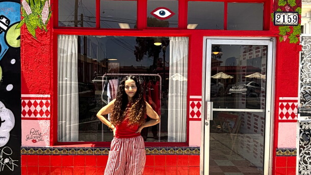 Artist Jiyan Rios Zandi stands outside of her shop, Brown Local Baby, on July 9, 2026.