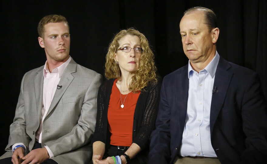 James Piazza (right) seated with wife Evelyn and son Michael speaks during an interview last year about his son Timothy, a Penn State sophomore who died after a hazing ritual.