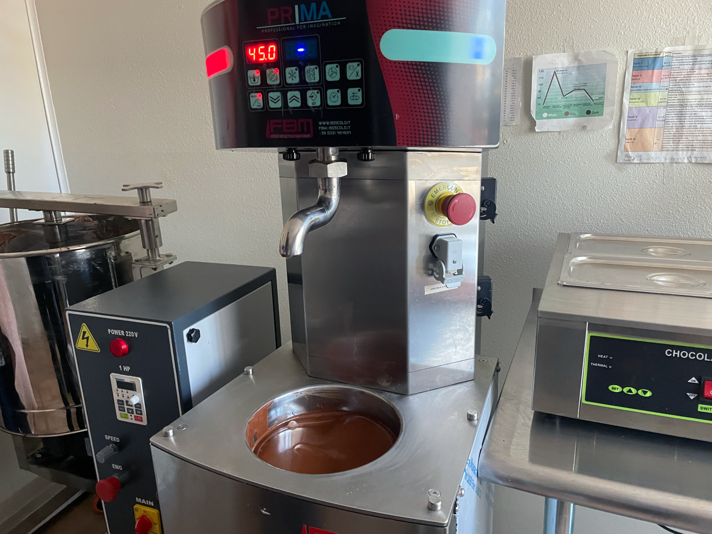 Chocolate in the tempering machine at Raíz Chocolate.