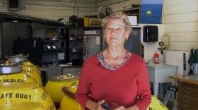 Julie Thomas, a researcher at Scripps Institution of Oceanography, stands in front of a network of wave-monitoring buoys as she explains a citizen El Niño science project, Nov. 5, 2015.


