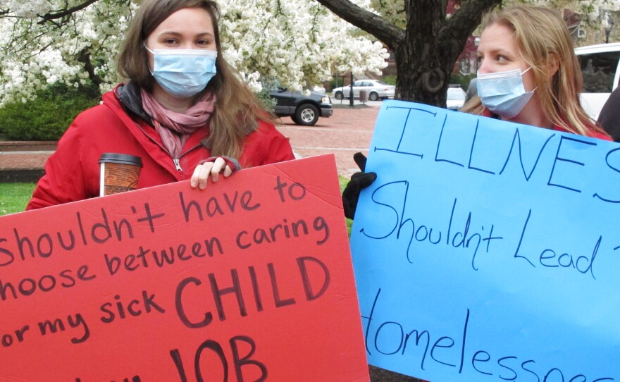 Sandy Robson (left) and Crystal Hall rally for legislation for paid sick leave on April 11, 2016, in Annapolis, Md. Under a bill recently sent to Gov. Larry Hogan, businesses with 15 or more full-time employees would be required to allow workers to earn at least five paid sick days a year.
