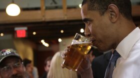 Then-presidential candidate Barack Obama is shown drinking a beer at a North Carolina bar in May 2008. His choice for Thursday night's beer summit at the White House: Bud Light.