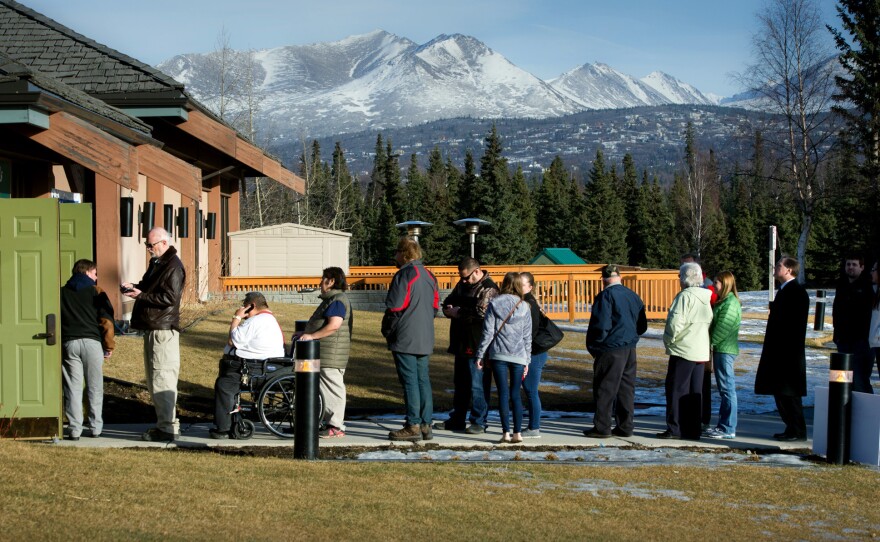Republican voters line up outside a polling place in Anchorage, Alaska. The Republican caucus there was the last Super Tuesday contest, ending at midnight ET.