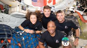 The Artemis II crew — Christina Koch (left), Jeremy Hansen, Victor Glover and Reid Wiseman — have to share tight quarters aboard the Orion spacecraft on their way home. But even with limited space, they can still get a solid workout in — thanks to a very special piece of equipment.