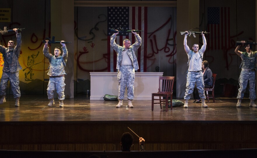 Chen's character, played by Stenson (second from left), drills with his battalion in Afghanistan in a scene from An American Soldier.