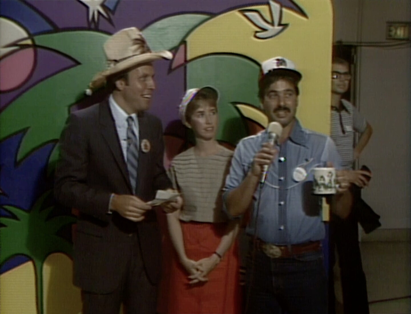 Ken Kramer and Tom Karlo appear on a KPBS TV auction.