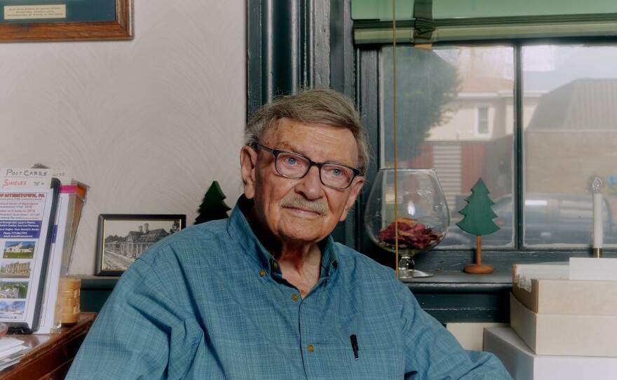 Brown poses for a portrait inside his home.