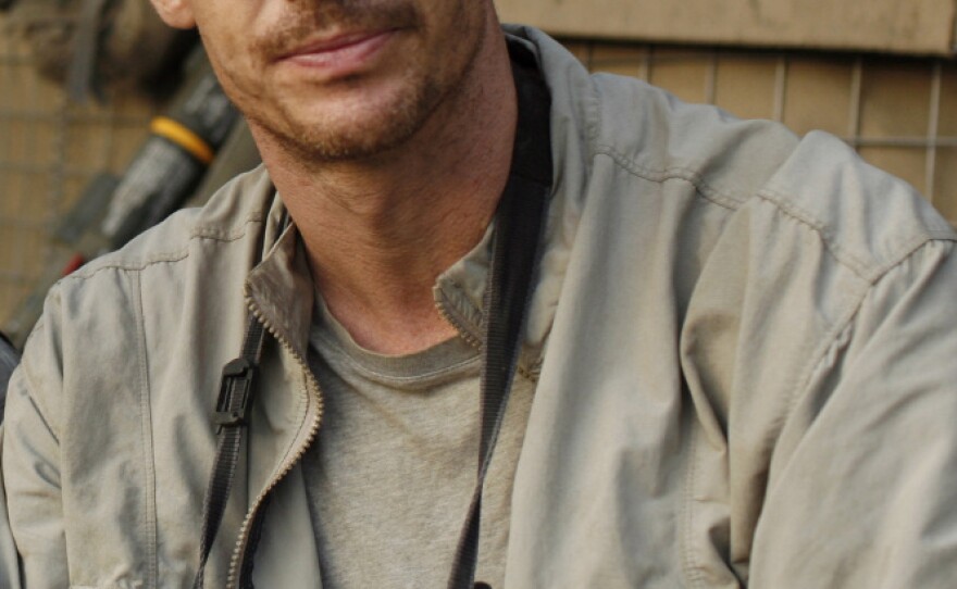 Photographer Tim Hetherington at the Restrepo outpost in the Korengal Valley, Afghanistan, during the filming of his documentary <em>Restrepo</em>. Hetherington was killed in Misrata, Libya, on April 20.