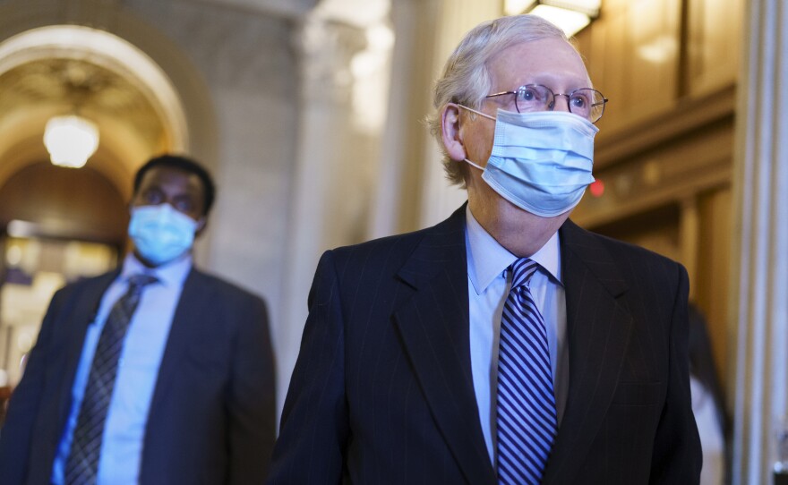 Senate Minority Leader Mitch McConnell, R-Ky., leaves the chamber Tuesday after criticizing Democrats for wanting to change the filibuster.