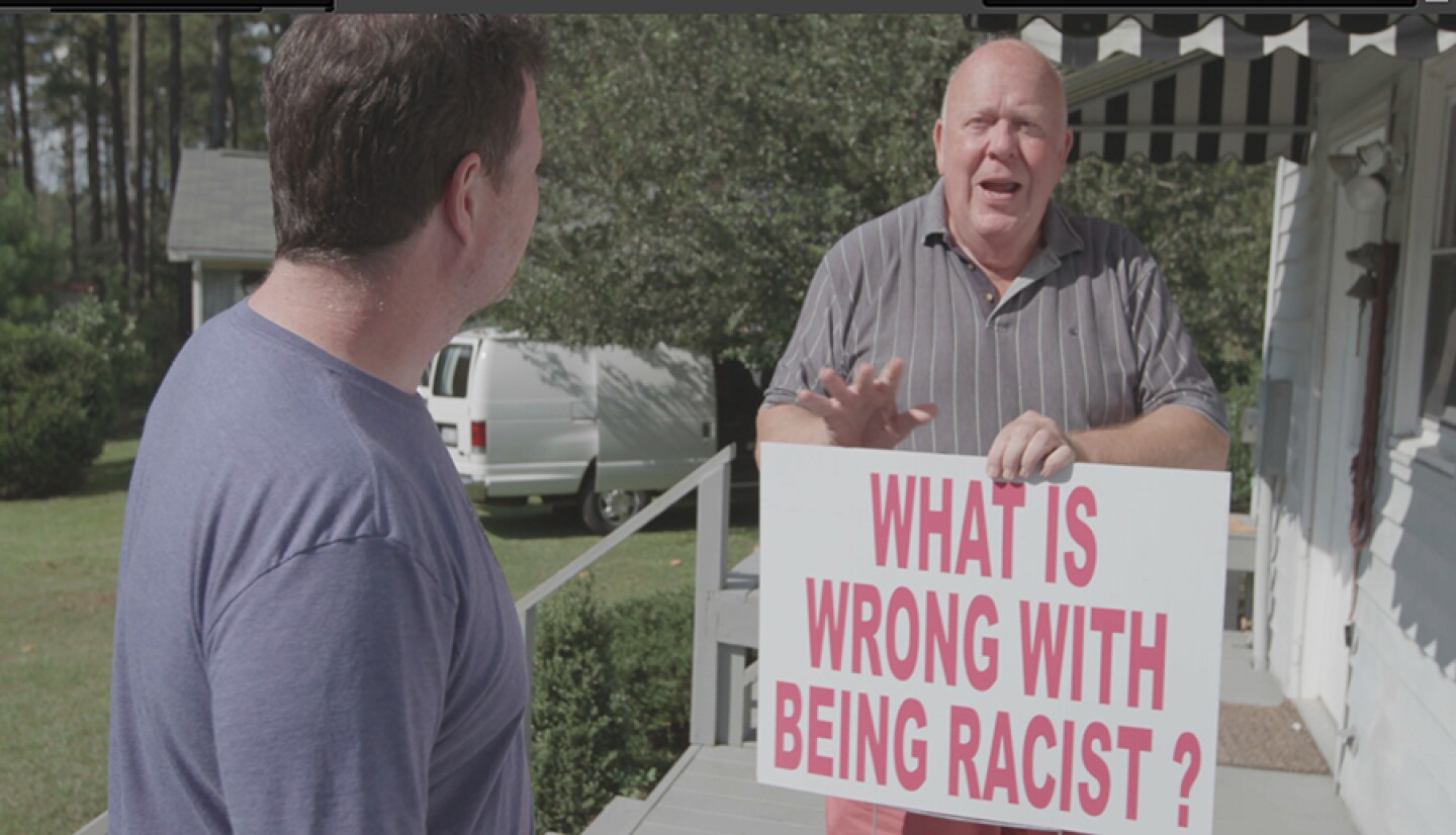 Russell Walker, Republican for North Carolina, State House District 48 with sign that reads "What is wrong with being racist?"