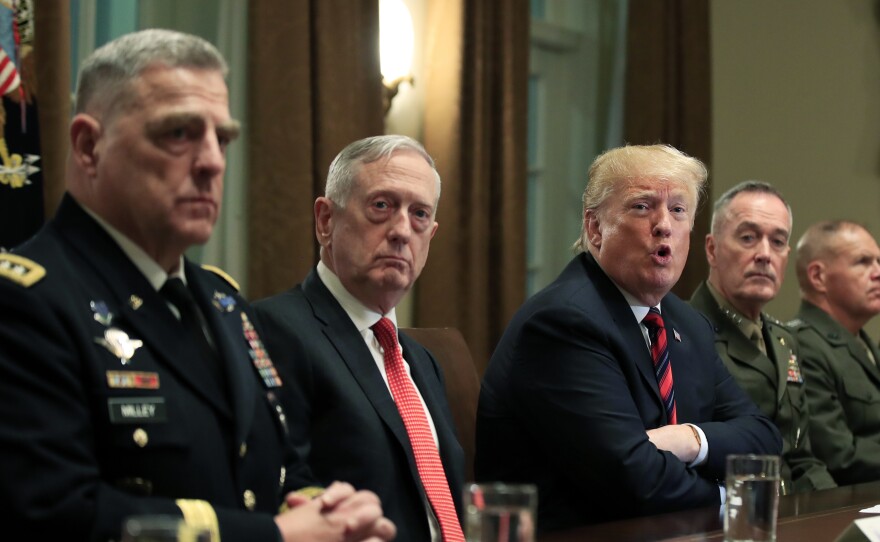 President Donald Trump in October 2018 with, from left, Army Chief of Staff Gen. Mark Milley, Defense Secretary Jim Mattis, Chairman of the Joint Chiefs of Staff Gen. Joseph Dunford and Marine Corps Commandant Gen. Robert Neller.