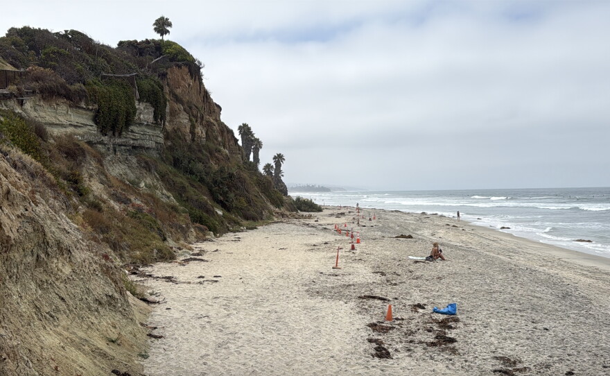 Traffic cones mark off an area at San Elijo State Beach where active bluff failure is occurring, July 9, 2026.