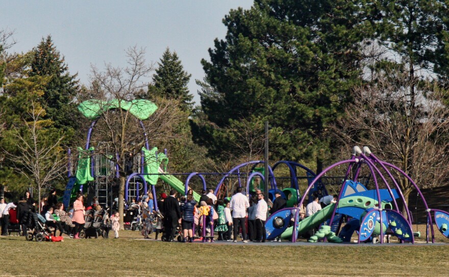 A crowd of parents and children at a playground during the COVID-19 pandemic in Toronto, Ontario, Canada on April 4. The country is experiencing a third wave of the coronavirus pandemic.