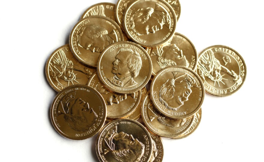 Golden dollar coins featuring Andrew Johnson, the 17th president of the United States.