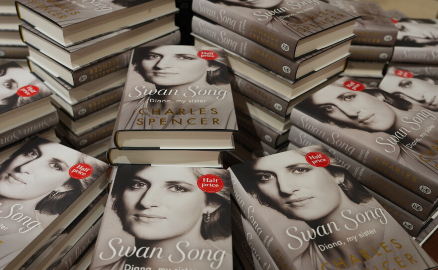 Copies of a new book by Earl Spencer, brother of the late Princess Diana, entitled "Swan Song: Diana, My Sister," on display in a bookshop in central London, Tuesday.